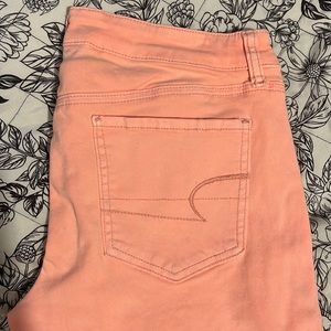 Neon pink American eagle skinny jeans